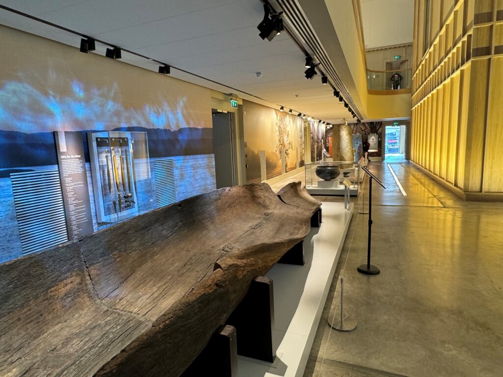 Exhibition in the Perth Museum showing the remains of an old wooden artefact